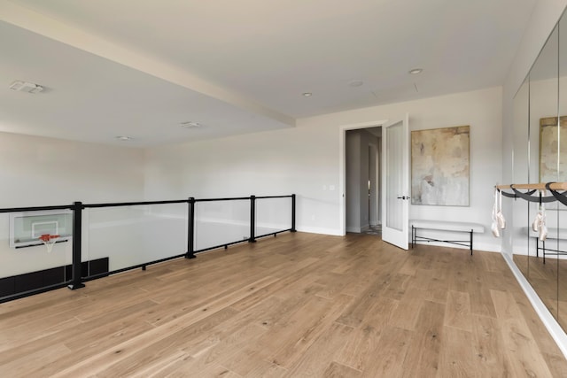 unfurnished room featuring light hardwood / wood-style flooring