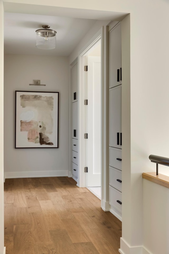 hallway featuring light hardwood / wood-style flooring