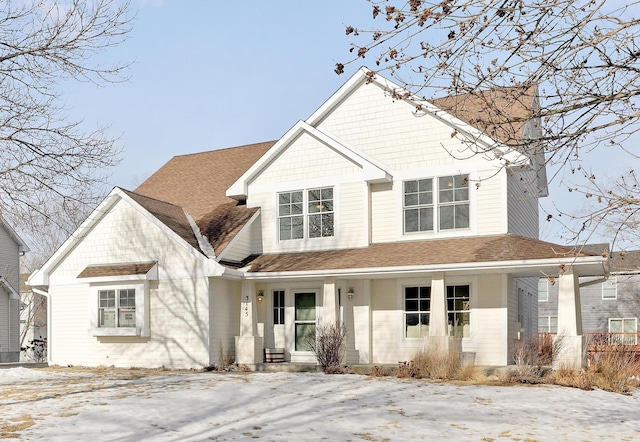 view of front of house with roof with shingles