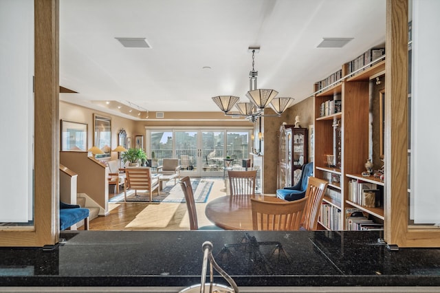 interior space with decorative light fixtures