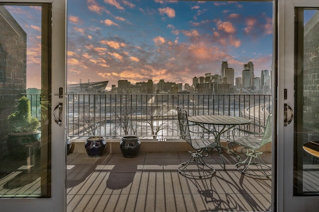 view of balcony at dusk