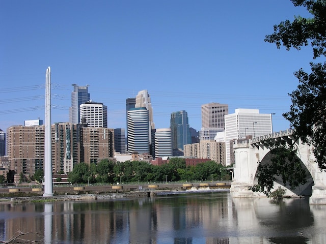 property's view of city with a water view