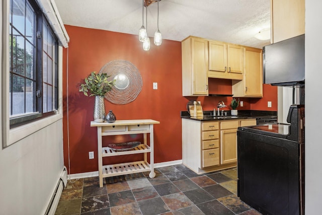 kitchen with black range with electric cooktop, a wealth of natural light, light brown cabinetry, and sink