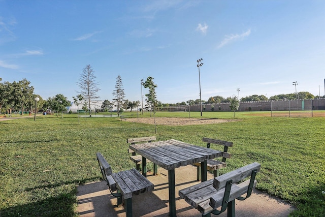 view of home's community with a lawn