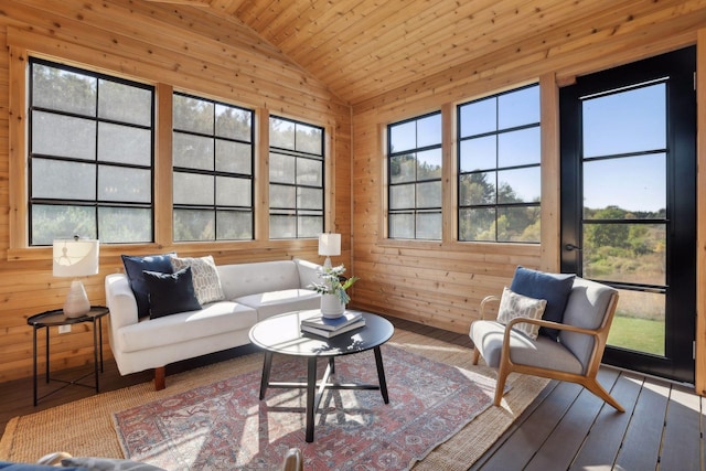 sunroom / solarium featuring lofted ceiling and wood ceiling