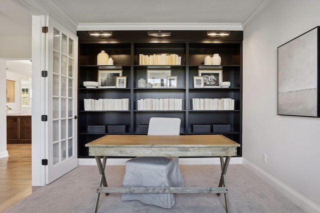 carpeted office space featuring ornamental molding