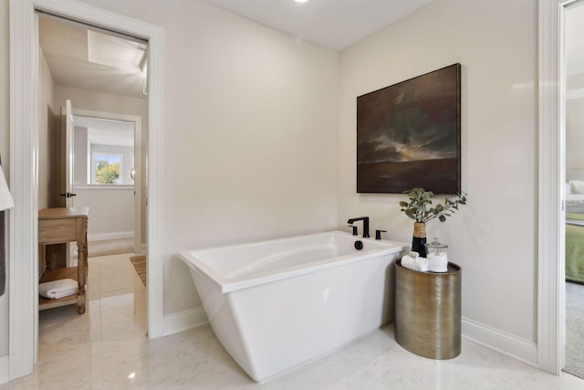 bathroom featuring a washtub