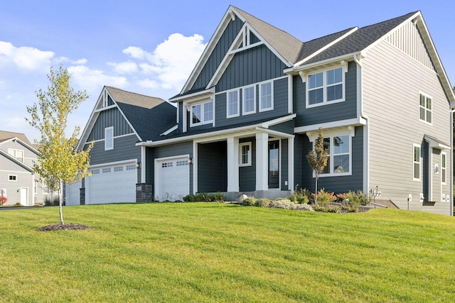 view of front facade featuring a garage and a front yard