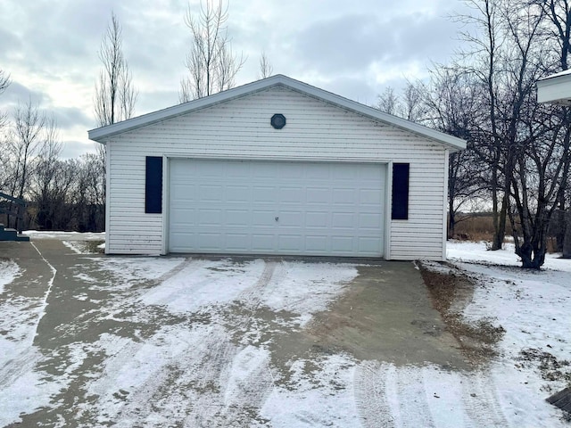 view of snow covered garage