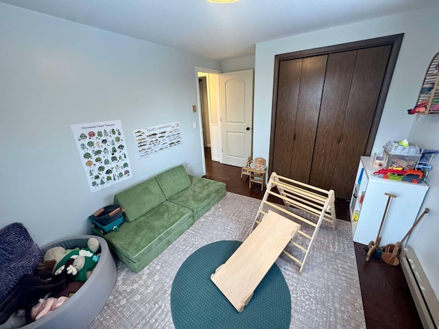 bedroom featuring dark hardwood / wood-style floors and a closet