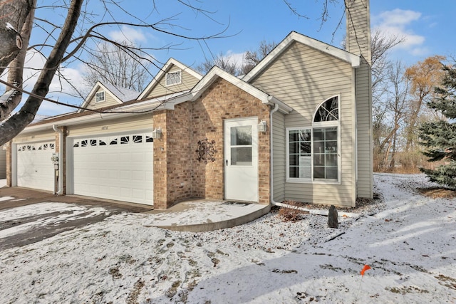 view of front of home featuring a garage