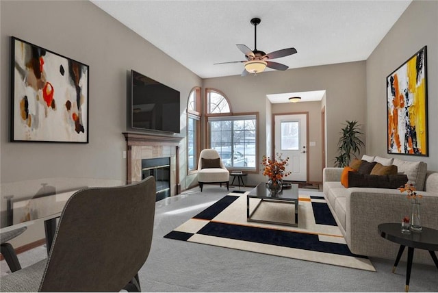 living room with carpet and ceiling fan