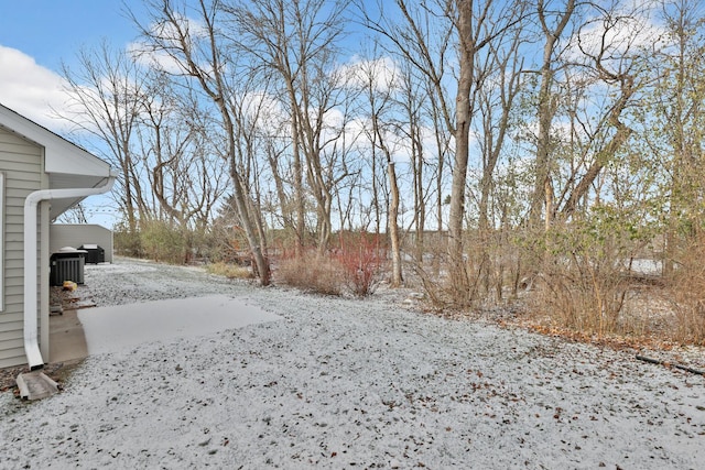 view of yard covered in snow