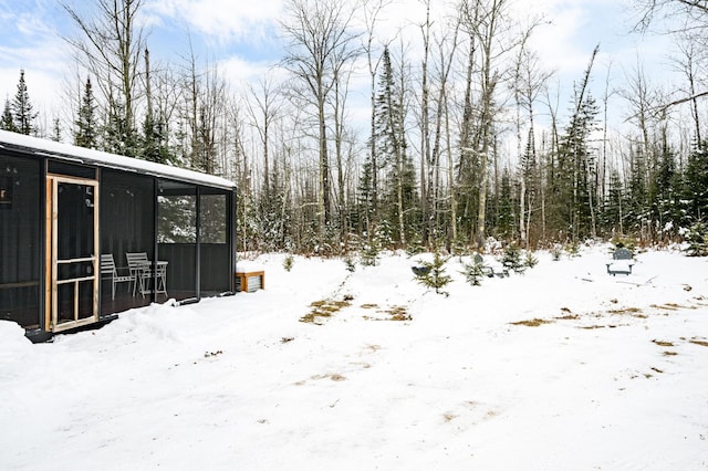 view of yard covered in snow