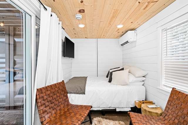 bedroom with a wall mounted AC, wooden ceiling, and wood walls