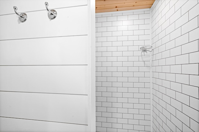 room details with a tile shower