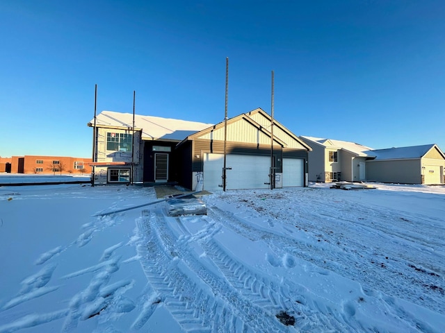 single story home with a garage