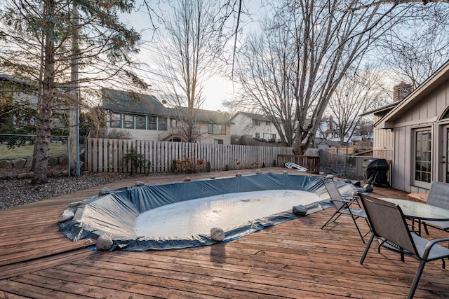 view of pool featuring a wooden deck