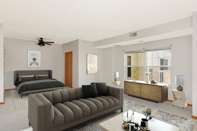 bedroom with light carpet and ceiling fan