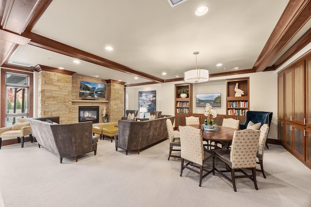 carpeted dining area featuring built in shelves and a fireplace