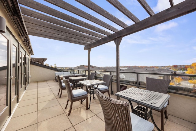 view of patio with a balcony and a pergola