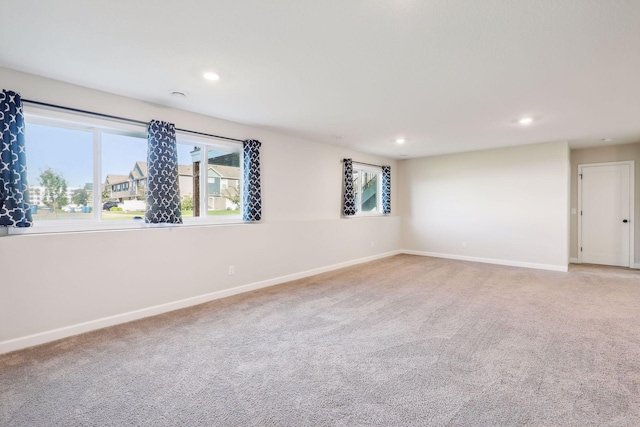 unfurnished room featuring carpet floors