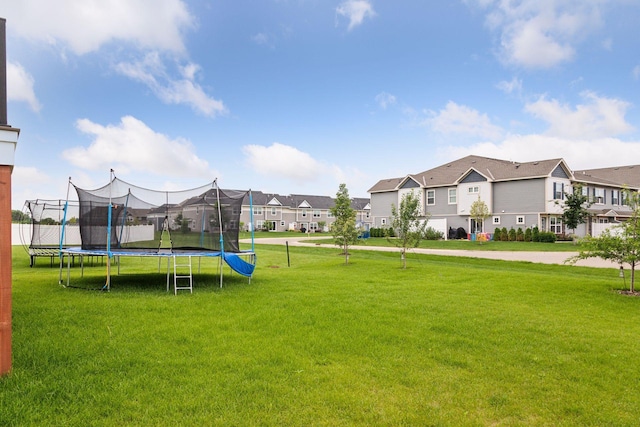 view of yard featuring a trampoline