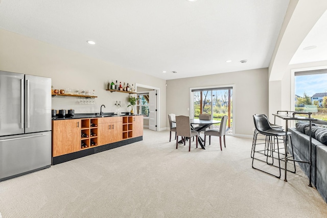 interior space featuring plenty of natural light and indoor wet bar