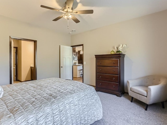 bedroom with ceiling fan and light carpet