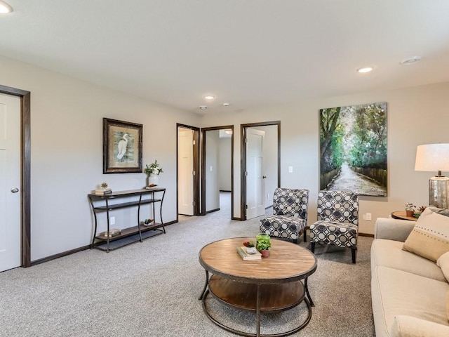 living room with light colored carpet