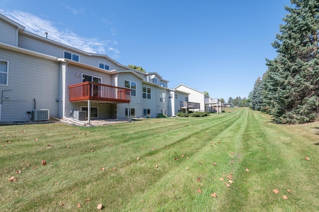 view of yard with central AC