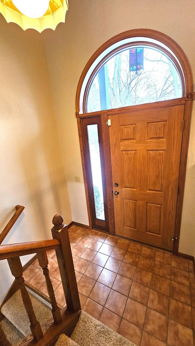 tiled foyer entrance with plenty of natural light