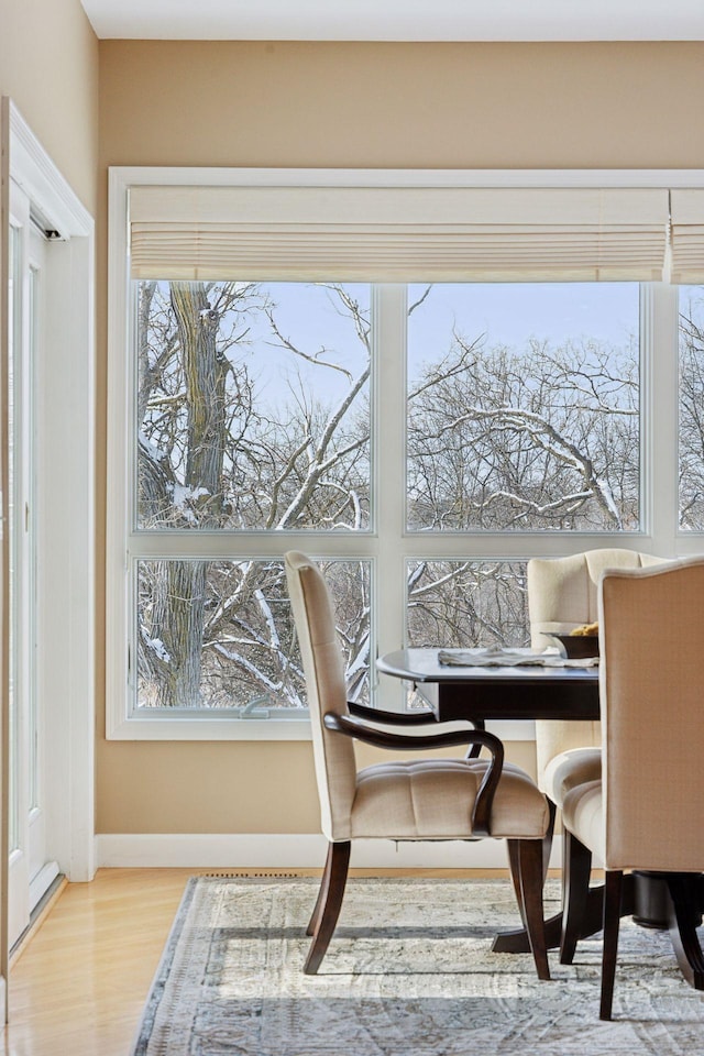 dining room featuring light hardwood / wood-style flooring