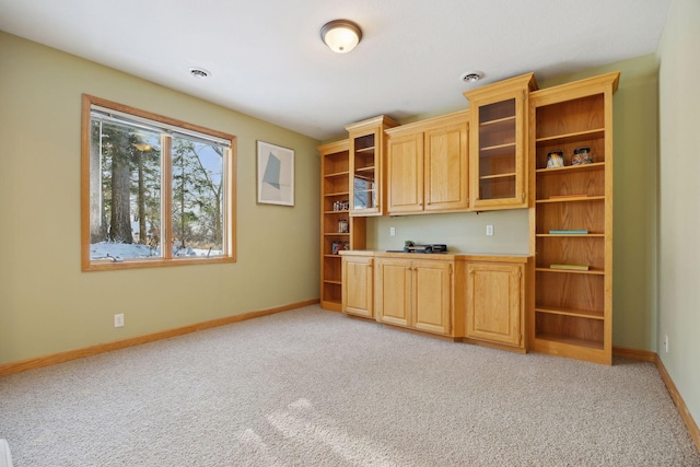 interior space featuring light colored carpet