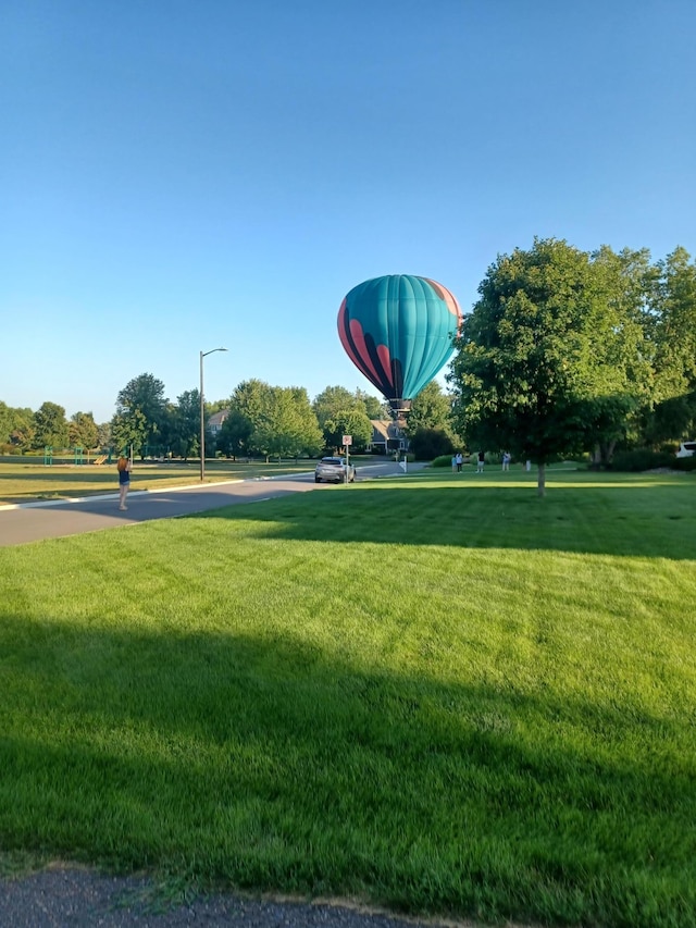 view of community with a lawn