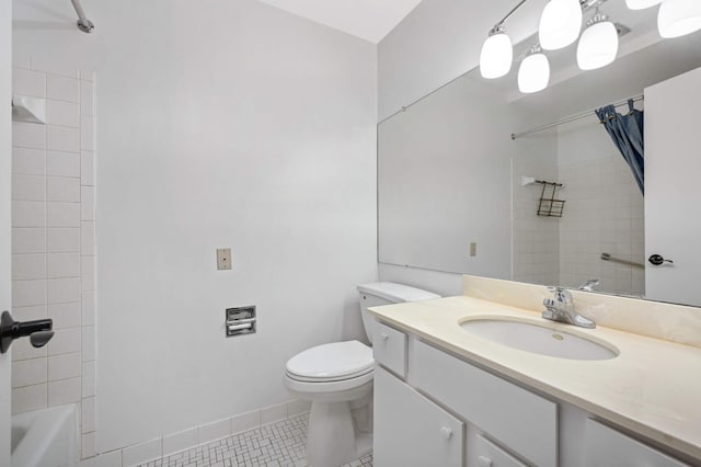 full bathroom featuring toilet, tile patterned flooring, shower / bath combo, and vanity