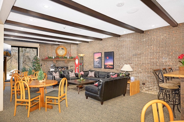 living room featuring a brick fireplace, brick wall, light carpet, and beam ceiling