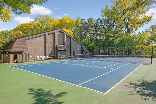 view of tennis court with basketball court