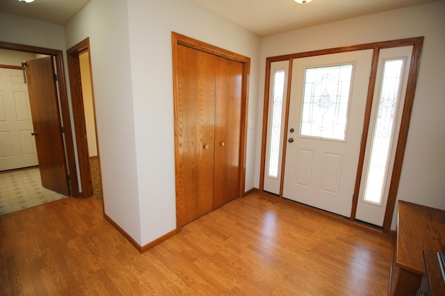 entrance foyer featuring light hardwood / wood-style floors