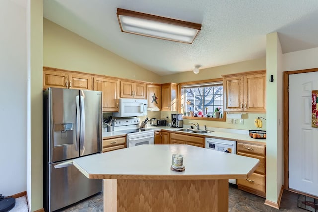 kitchen featuring vaulted ceiling, a kitchen island, sink, and white appliances