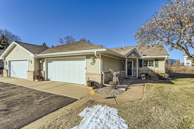 single story home with a garage and a front yard