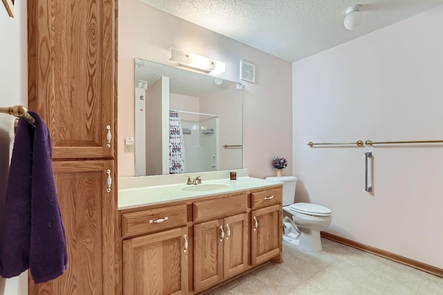 bathroom with walk in shower, vanity, toilet, and a textured ceiling