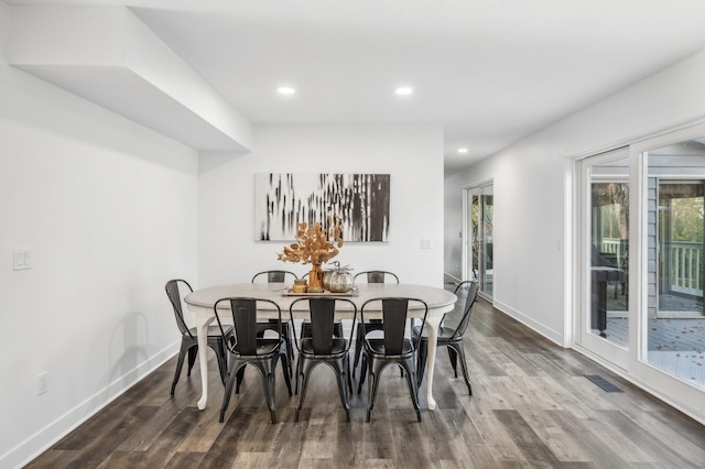 dining area featuring wood-type flooring