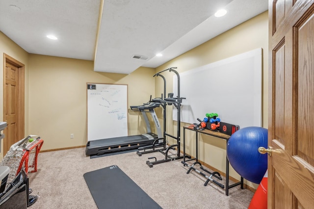 exercise area with carpet flooring