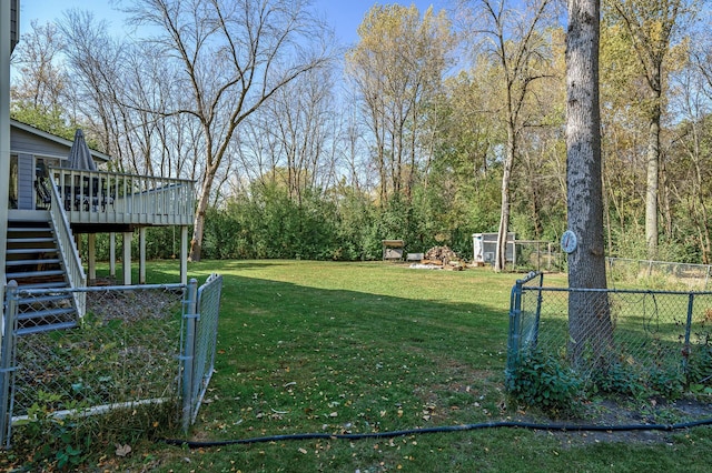 view of yard featuring a wooden deck