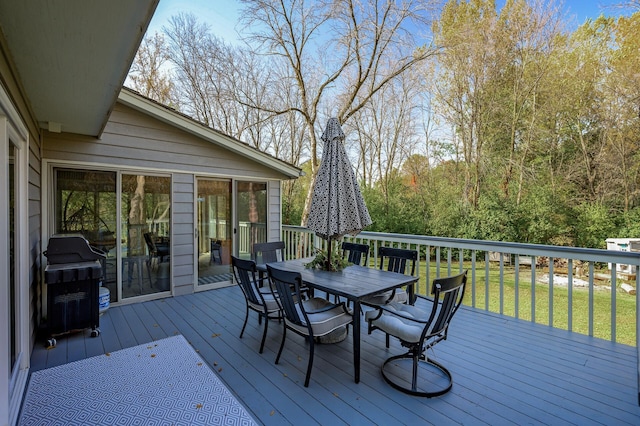 deck featuring a grill