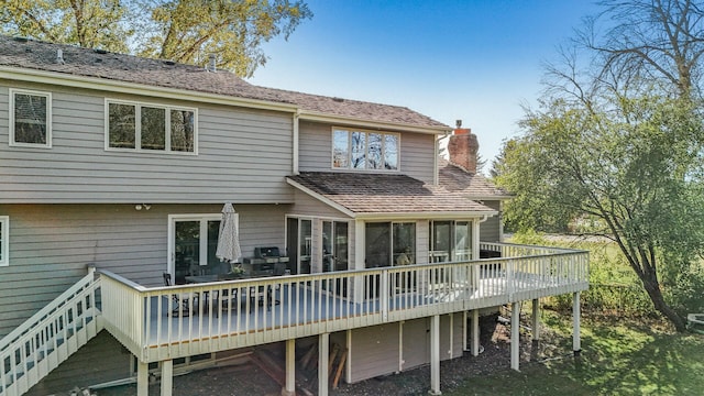 rear view of house with a deck