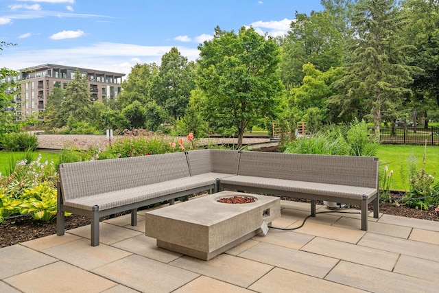 view of patio featuring an outdoor fire pit