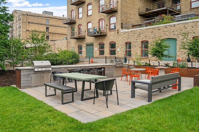 view of patio / terrace featuring an outdoor kitchen and area for grilling