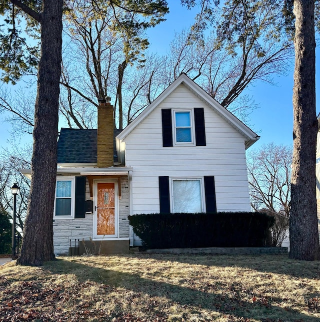 view of front of home with a front yard